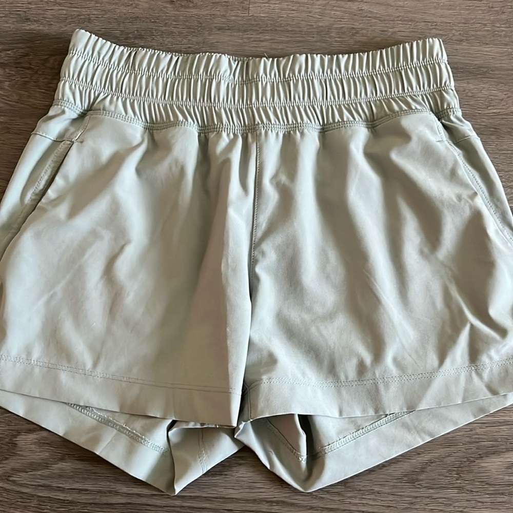 Free fly light green athletic shorts